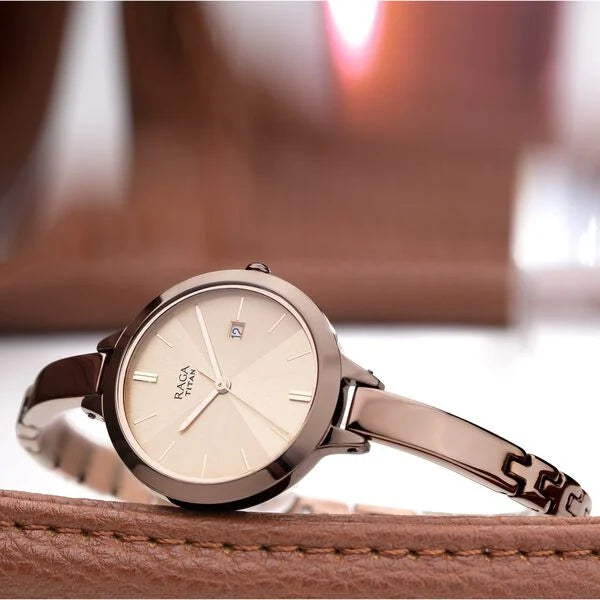 Titan 2578QM01 | Titan Quartz Analog with Date Rose Gold Dial Brown Metal Strap Watch For Women