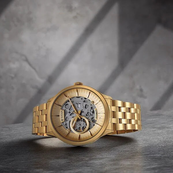 Titan 90140YM01 | Titan Metal Mechanicals Golden Dial Golden Stainless Steel Strap Watch for Men