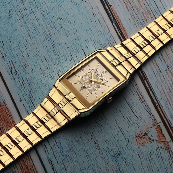 Titan 9151YM07 | Titan Karishma Analog Champagne Dial Watch for Men